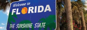 Welcome to Florida sign and palm tree